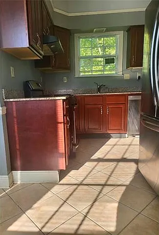 4718 Reynes St — Photo 6