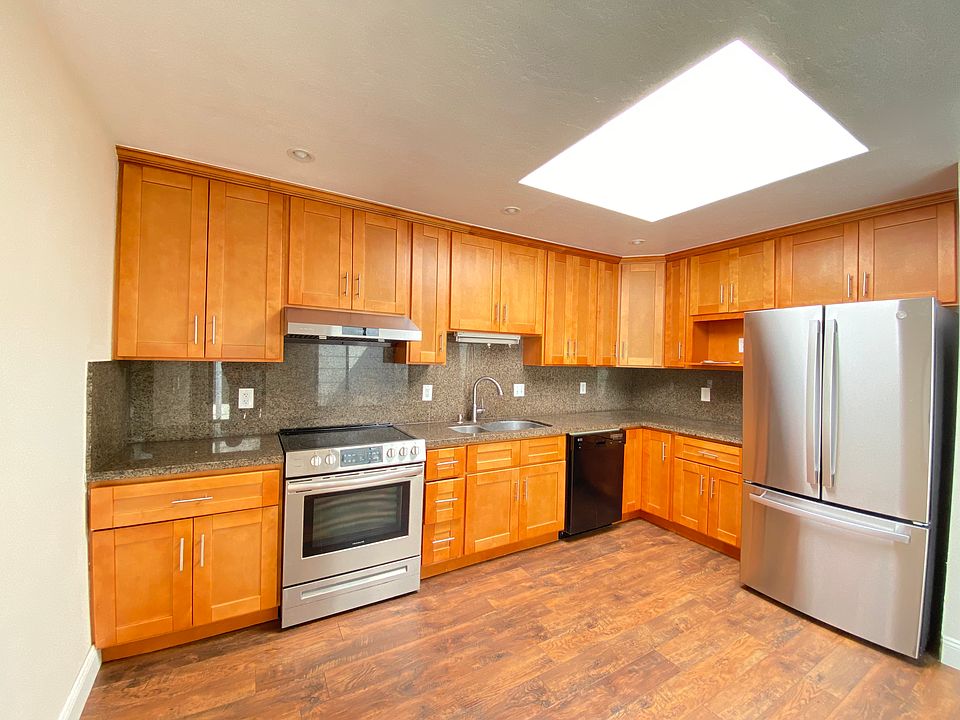 Kitchen with stainless steel appliances.
