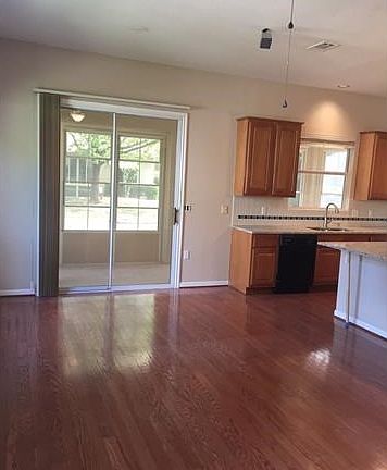 Family room looking toward enclosed porch with air condition