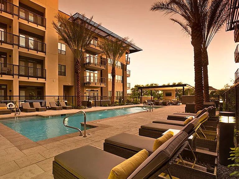 Lap pool with outdoor lounge and fire pit