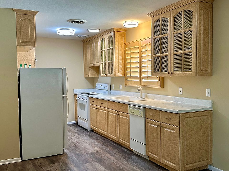 Kitchen has lights, a skylight plus windows for plenty of light!