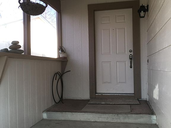 Front door entry with enclosed "breezeway"