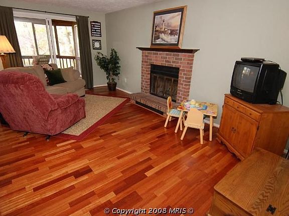 Large family room walks out to the screened in porch