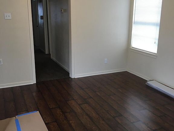 Living room with beautiful new wood laminate flooring