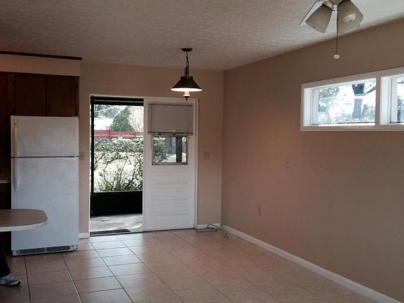 Dining area & living room opens to screened porch