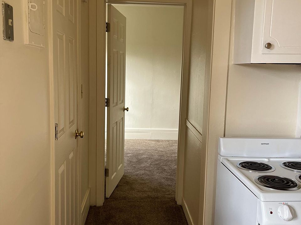 Hall from kitchen to bedroom- bathroom is door on the left