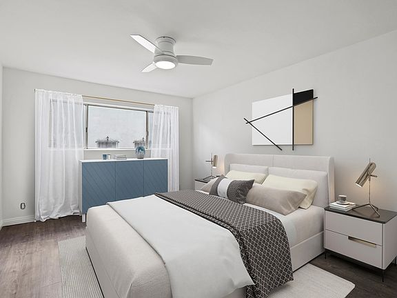 Large primary bedroom with two closets