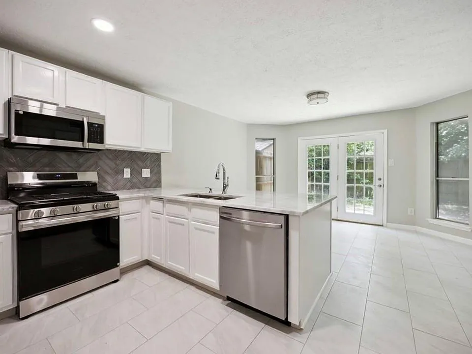 12215 Cardston Ct