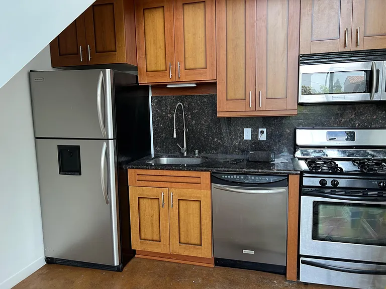 kitchen corner, set within the living area