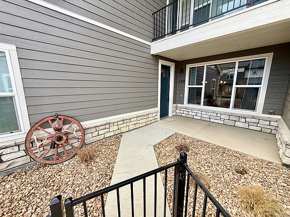 Winter time. Front door entry with gated patio.