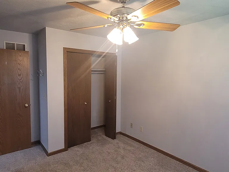 Look from the bedroom to the outside hall and the closet.