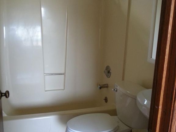 Upstairs bathroom: next to living room and foyer