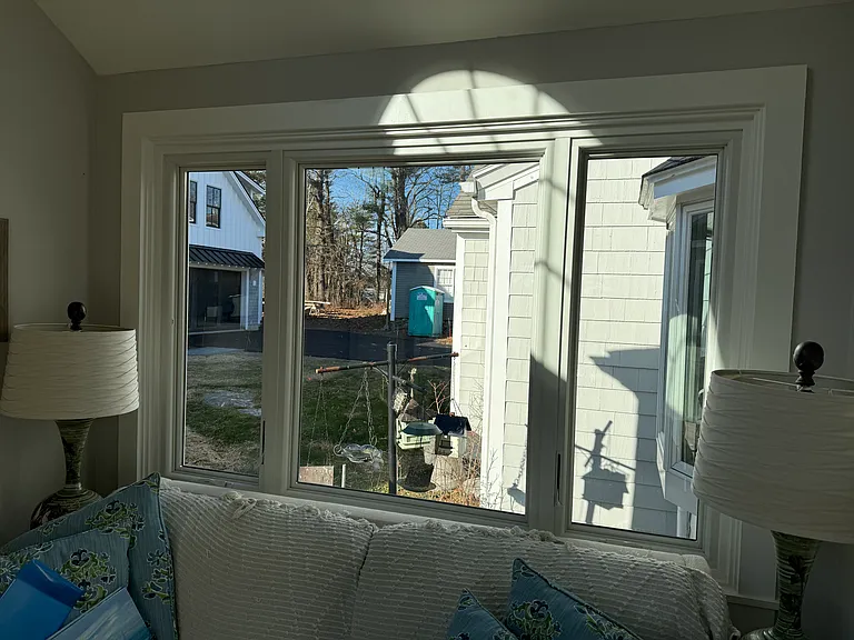 Den window, other window looks at water