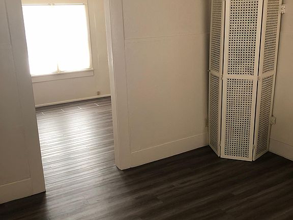 kitchen area leading into living room