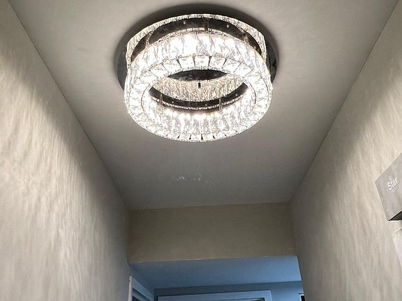 Beautiful chandelier in hallway