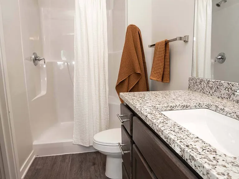 Modern bathroom located at Heartland Flats Alliance.