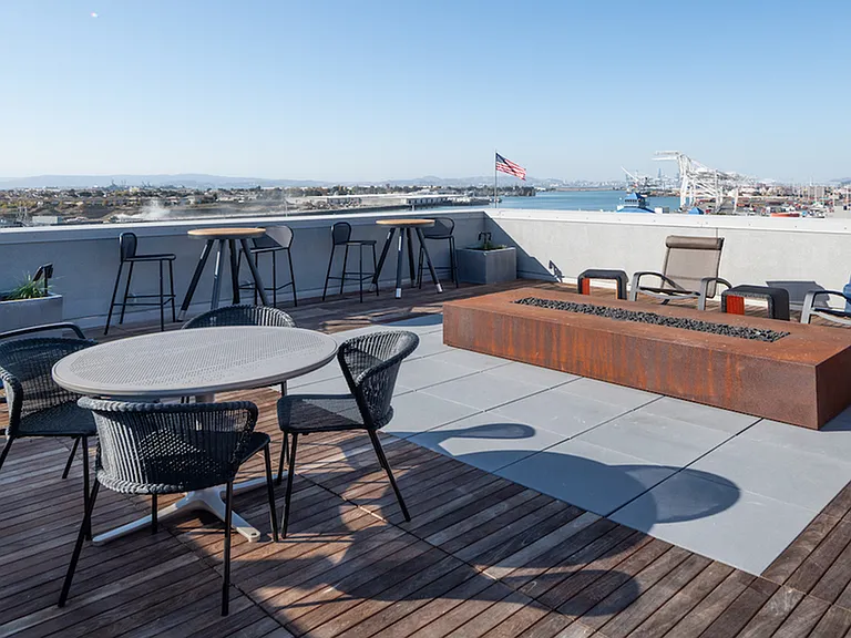 Enjoy a glass of wine and our amazing view next to our rooftop firepit