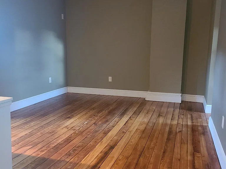 Bedroom with original hardwood floors