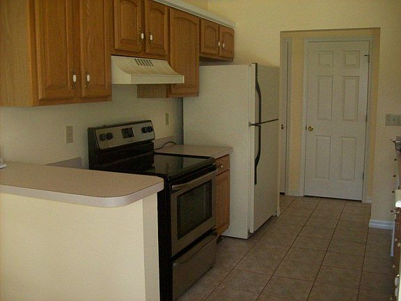 Kitchen with ref,. stove, dishwasher
