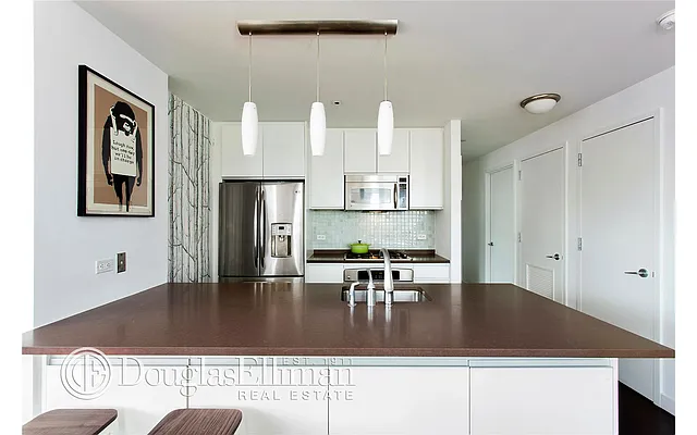 Sold by Douglas Elliman | media 19