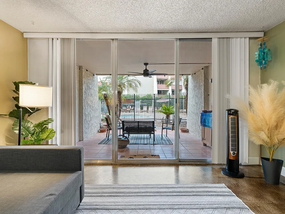 Ground Floor cool back patio just steps from pool and hot tub
