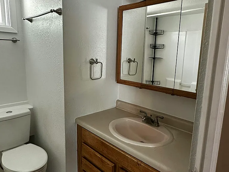 Bathroom with tub and shower