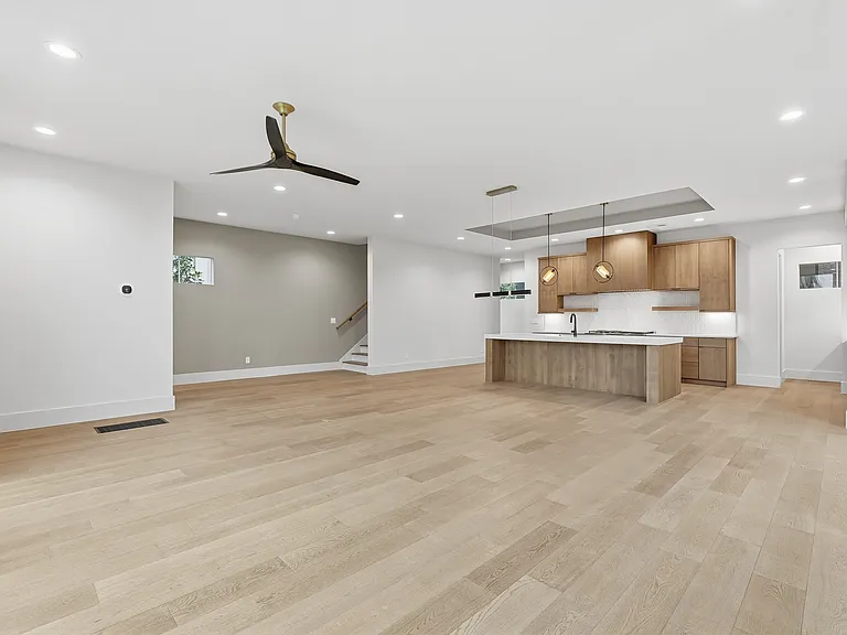 Spacious living area with natural light and modern finishes