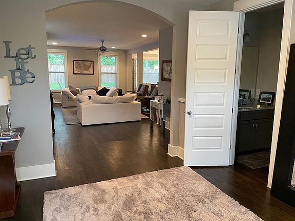 Half bath on right, photo looking into living room from front door.