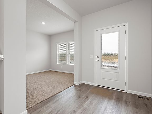 There is a flex room off of the foyer