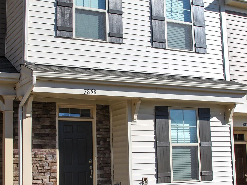 Front of house. Two reserved parking spots are directly in front of the house.
