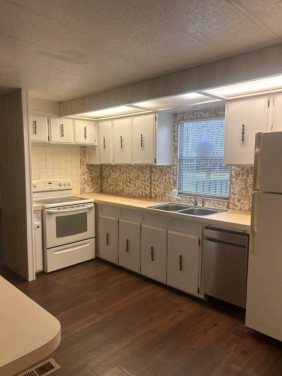 Kitchen with stove, dishwasher and refrigerator - Camerton Rd