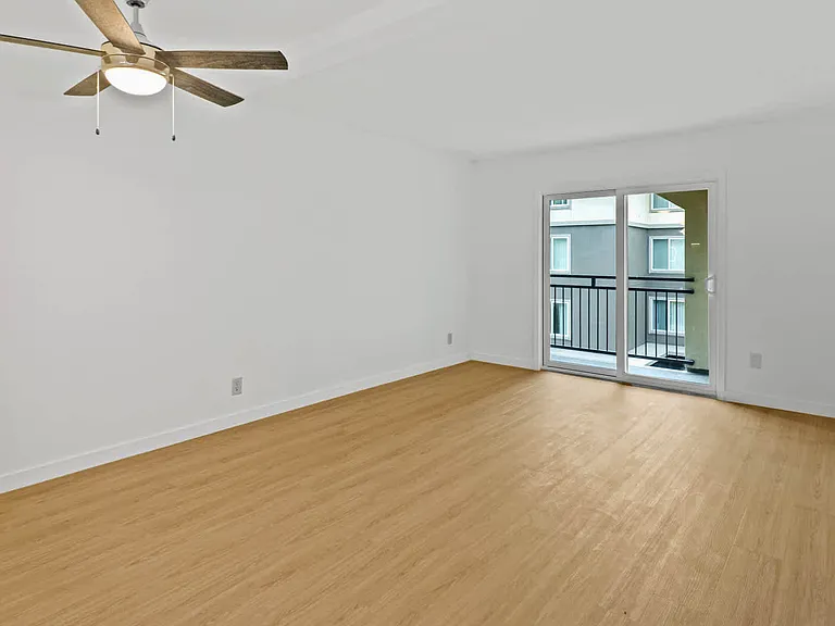 Living Room with Balcony and Hard Surface Flooring