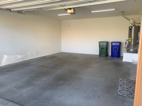 Attached 2 car garage, +- dimensions:
Door height 7'11" ,19' wide interior width.
22.5 ft deep, 15.8" wide opening