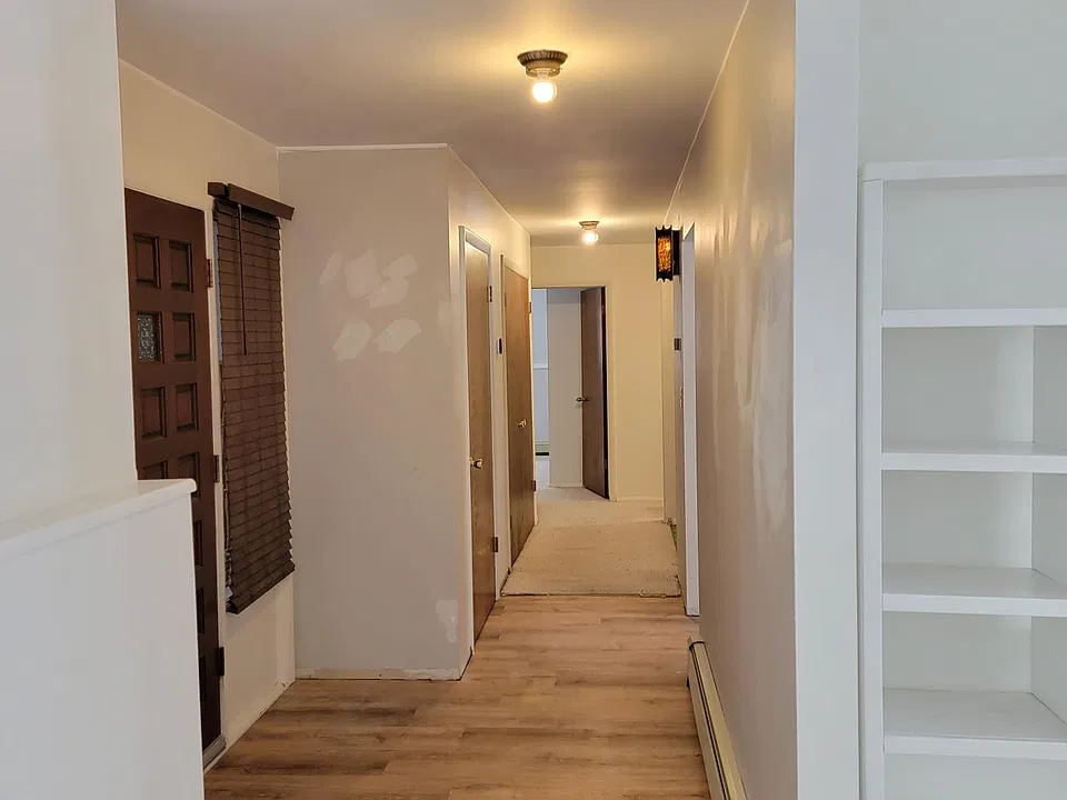 Hall - Going past front door on left towards bedrooms.