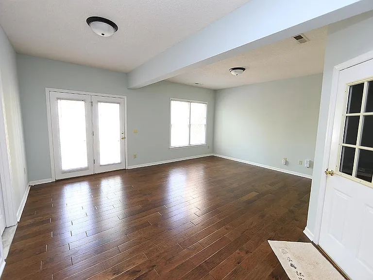 Large lower level room can be used as an office, playroom, den or guest room.