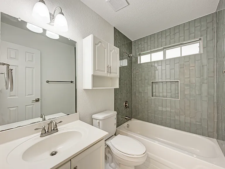Secondary Bathroom with New tiles and new flooring
