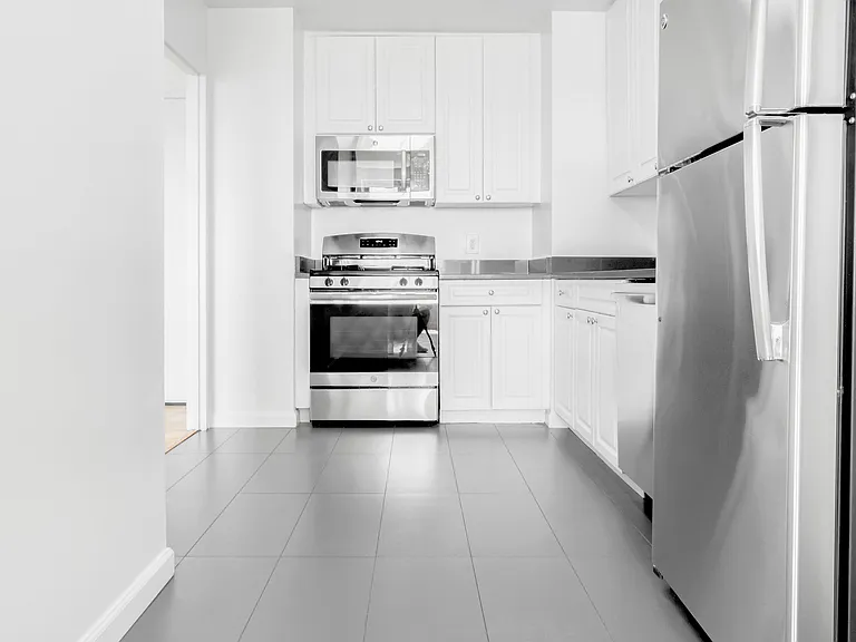 Step into the modern elegance of The Century's kitchen, featuring sleek appliances, ample storage, and a spacious layout, perfect for culinary creativity. Elevate your lifestyle today-schedule a tour to envision your new home.