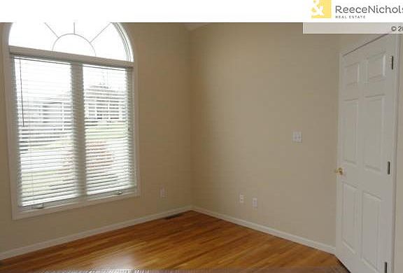 Main Level office, vaulted ceiling, ceiling fan, refinished wood