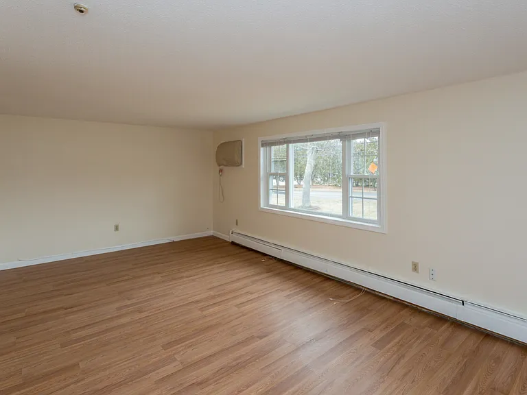 Bedroom With Wooden Floors