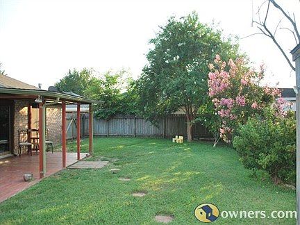 Big back yard with covered deck