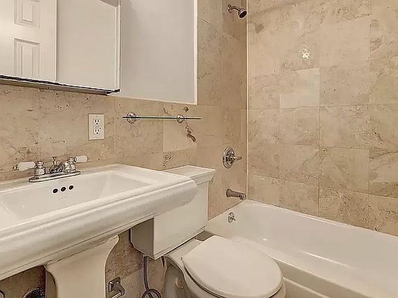 3rd image of 410 E 13th St APT 3D