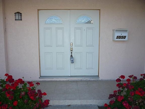 Double entry doors for elegance lead to a semi-formal foyer.