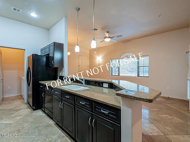 2010 E River Rd #203 — Photo 12