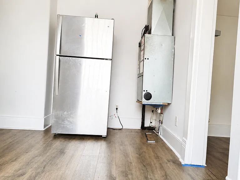 Fridge and wall mounted electric HVAC (central heat & ac).
