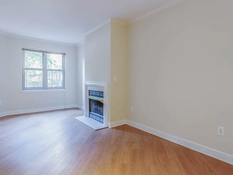 Living Room with Fireplace and Hard Surface Flooring