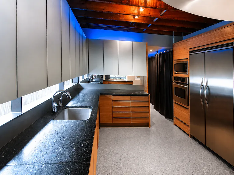 gourmet kitchen w/lots of storage and daylight coming into the countertop. Designer Viking Stove and Viking refrigerator