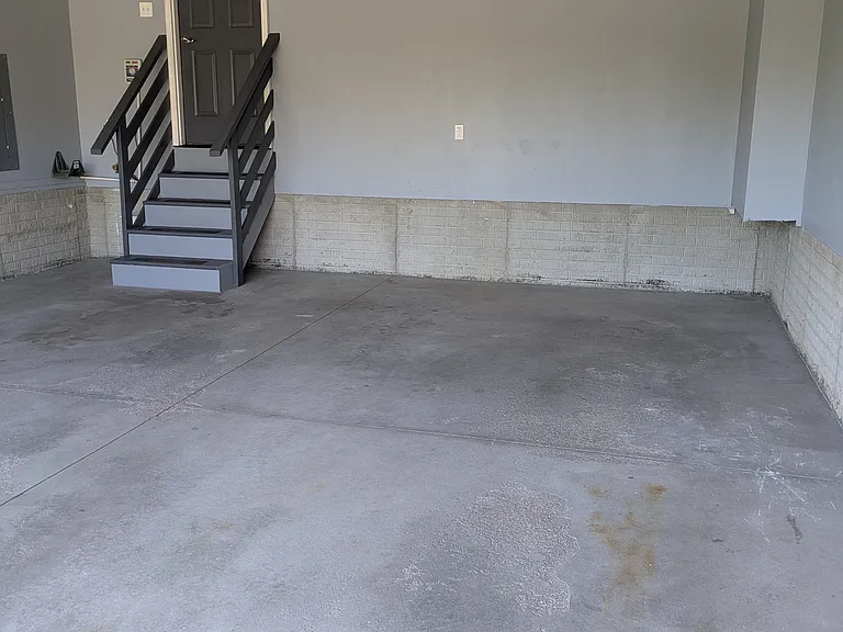 The 2-car garage features an automatic opener and adequate space.
