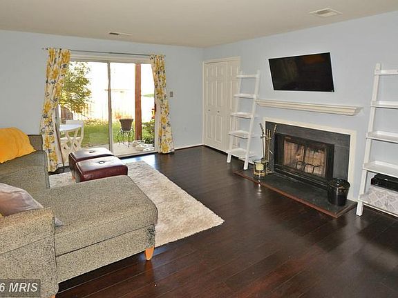 wood burning fireplace, storage closet, patio