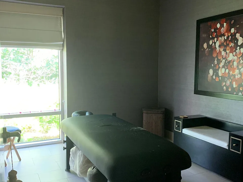 Typical rentable booth setting for body message or facial treatment room. with waiting chair