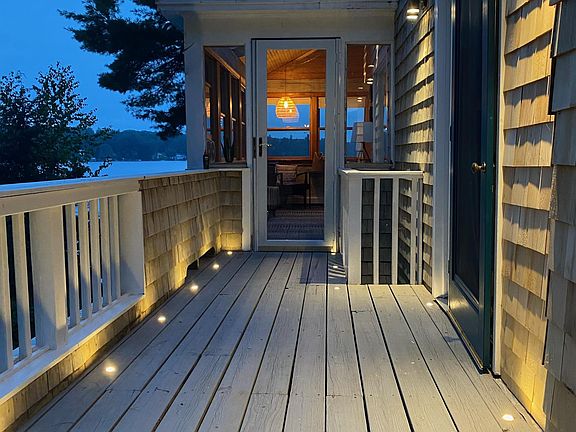 Side deck to main front door, and sun-porch.